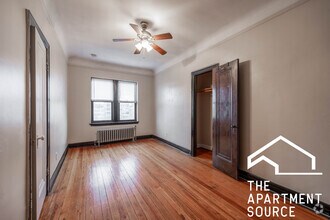 Building Photo - 948 W Cuyler Ave