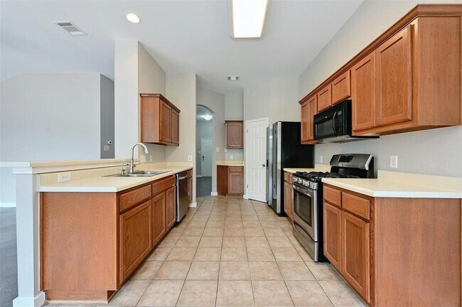 Foto del edificio - 12117 Tumbling Creek Trail