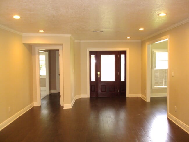 Entrance with gorgeous wooden door - 2490 Harrison Ave