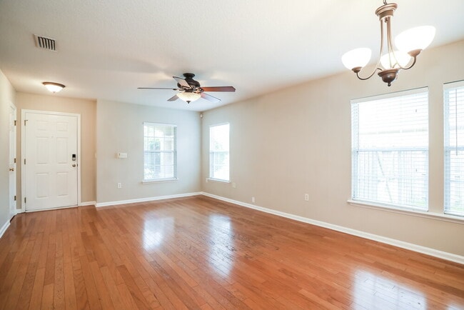 Building Photo - 11311 Justin Oaks Dr N