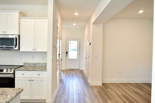 Building Photo - This gorgeous new construction home in Ward Creek overlooks a protected nature preserve.