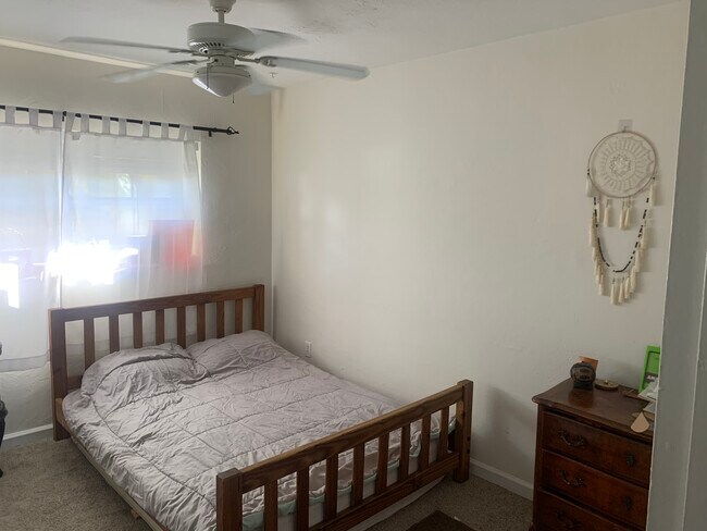 Unfurnished bedroom with attached bathroom - 8600 SW 67th Ave
