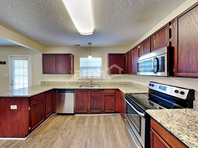 Foto del edificio - 4718 Winterberry Ln