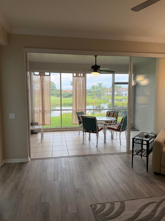 Enclosed lanai for extended year living space. - 9231 Spring Run Blvd