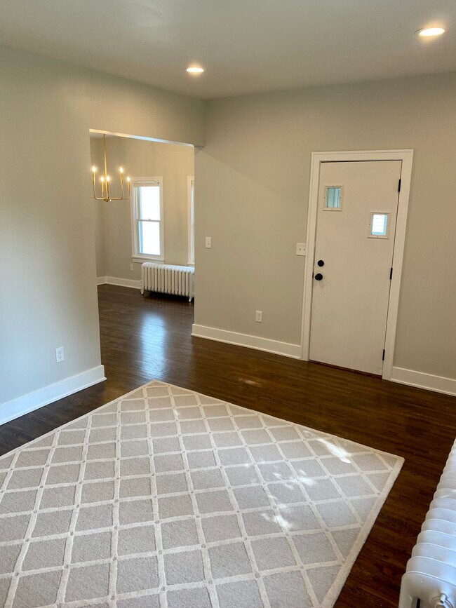 Living room with view to dining room - 401 Sherburne Ave