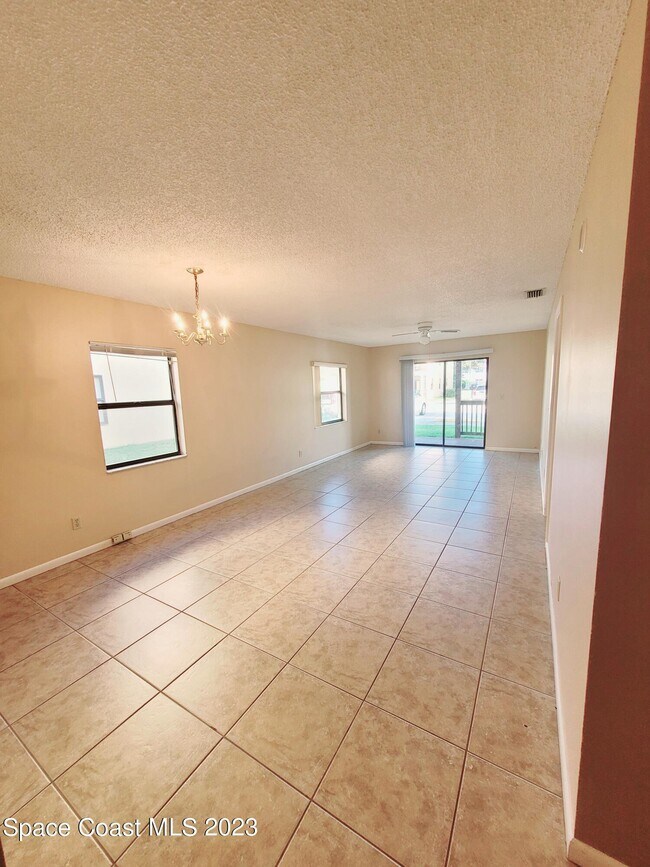 Building Photo - 5640 N Banana River Blvd