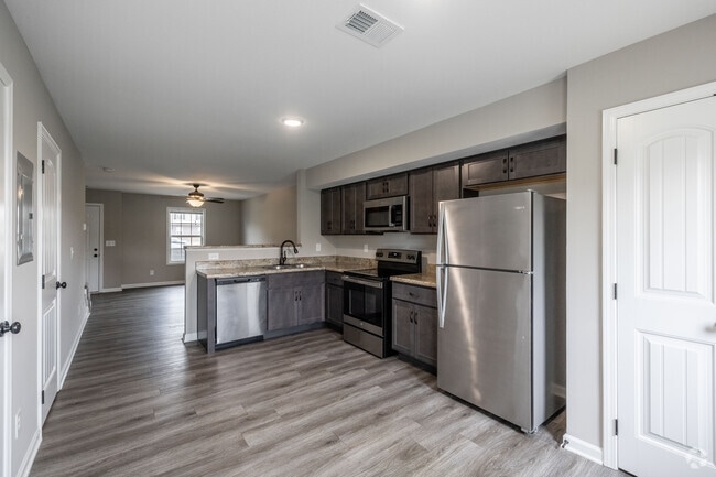2BR, 2.5BA - 1,005SF - Kitchen - Chalet Village Townhomes