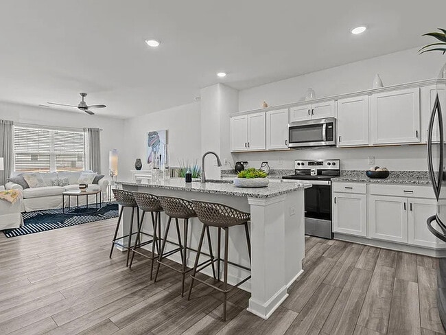 Building Photo - Earn Wealth While Leasing - Like a Homeown...