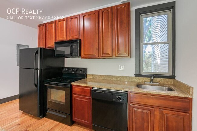 Foto del edificio - 4 Bed Cecil B Moore Apartment