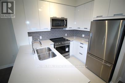 Photo du bâtiment - 65 Watergarden Dr