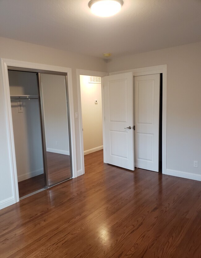 Primary bedroom with two closets. - 2724 Wiswall Dr