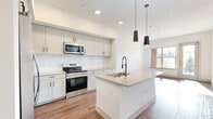 Step into a world of contemporary elegance where every detail has been thoughtfully curated for your comfort and delight. The heart of this home is the stunning chef's kitchen, a culinary masterpiece with sleek cabinetry, quartz countertops, and high-end stainless steel appliances. The open concept design seamlessly connects to a light-filled living area, perfect for entertaining or relaxing after a long day.

The spacious bedroom is a serene retreat, bathed in natural light from large windows that offer picturesque views. The luxurious bathroom features a glass-enclosed shower with marble-inspired tilework, exuding spa-like tranquility. Gleaming hardwood floors throughout add warmth and sophistication to the space.

Energy-efficient features and modern amenities, including in-unit laundry, ensure convenience and comfort in your daily life. The private balcony provides an ideal spot for morning coffee or evening relaxation, connecting you with the vibrant Colorado outdoors.

Located in the desirable Broomfield area, this home offers the perfect balance of urban accessibility and suburban tranquility. Imagine weekends exploring nearby parks, dining at local hotspots, or simply basking in the Colorado sunshine from the comfort of your own home.

This is more than just a living space; it's an opportunity to elevate your lifestyle. Whether you're a young professional, a couple, or someone seeking a luxurious downsizing option, this property promises to be the canvas for your next chapter. Don't miss the chance to make this exquisite space your own and start living the life you've always dreamed of.
