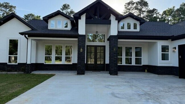 Building Photo - 34119 Conroe Huffsmith Rd