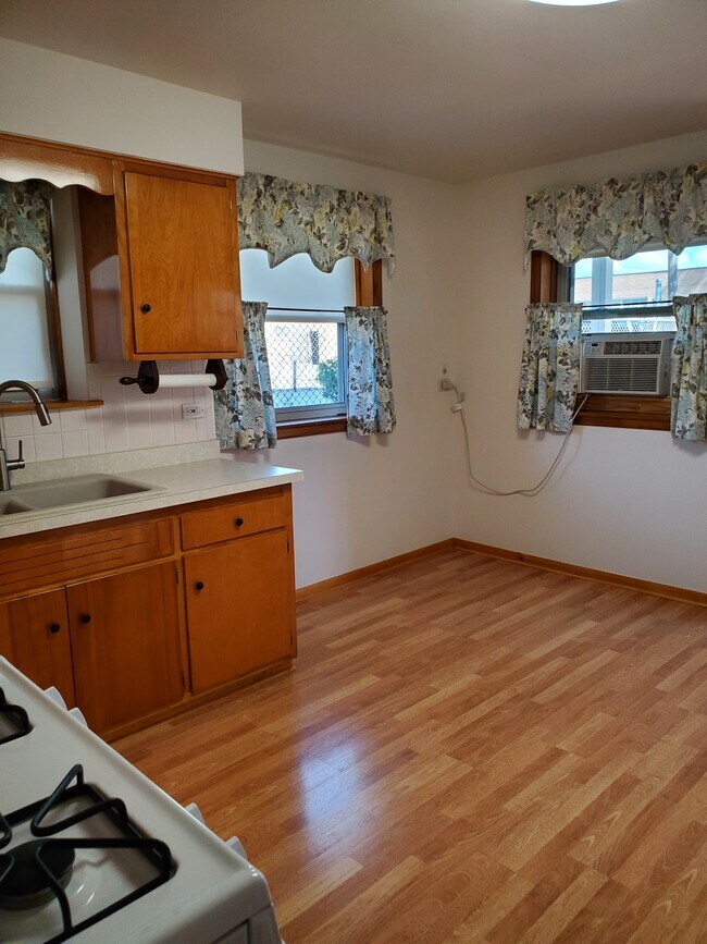 Eat-In Kitchen Area - 7130 W Jarvis Ave