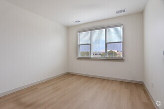 1BR, 1BA - 687 SF - Bluebonnet Livingroom - Meridian at Wylie - 55+ Affordable Apartments