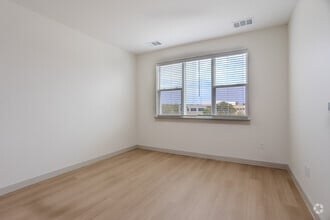 1BR, 1BA - 687 SF - Bluebonnet Livingroom - Meridian at Wylie - 55+ Affordable Apartments