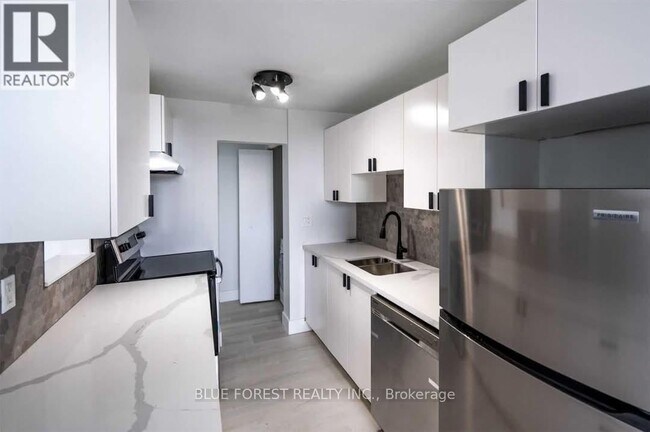 Photo du bâtiment - 931-931 Wonderland Rd S