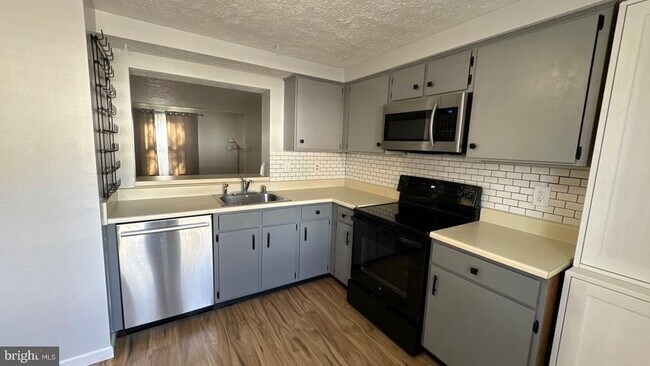 Foto del edificio - 9529 Quarry Bridge Ct