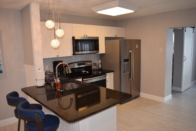 2340 NE Rustic Way, Jensen Beach, FL 34957 Townhome Rentals in Jensen