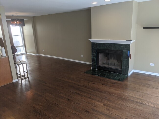 Living/dining area on main floor without furniture - 6127 S Woodlawn Ave