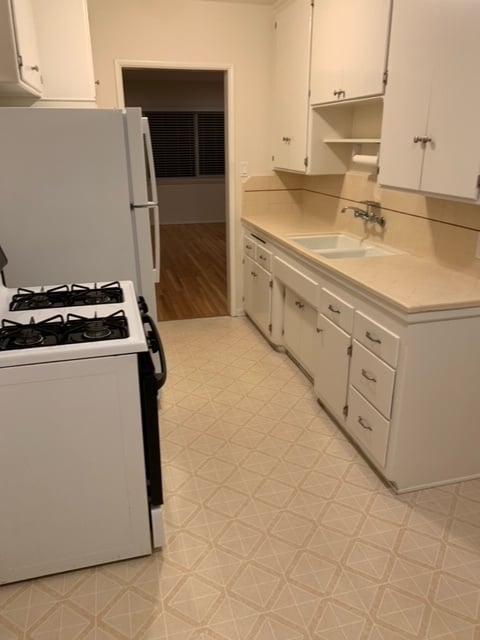 Kitchen counter has been upgraded to quartz - 7844 Flight Ave