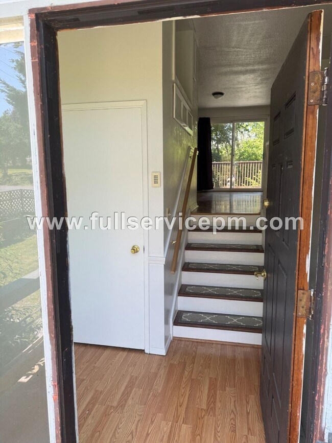 Building Photo - Spacious 4-Bedroom Upper-Level Home with Fireplace, Bonus Room & Large Deck