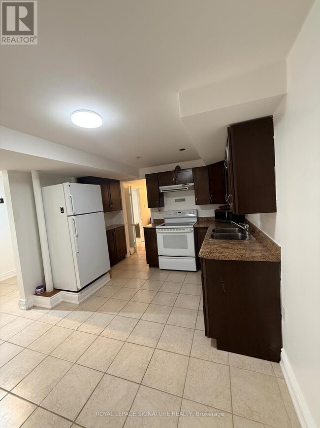 Building Photo - 6359 Plowmans Heath