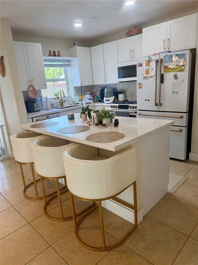 Foto del edificio - 6497 W 8th Ln