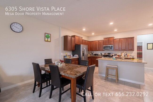 Foto del edificio - 6305 Shore Vista Pl