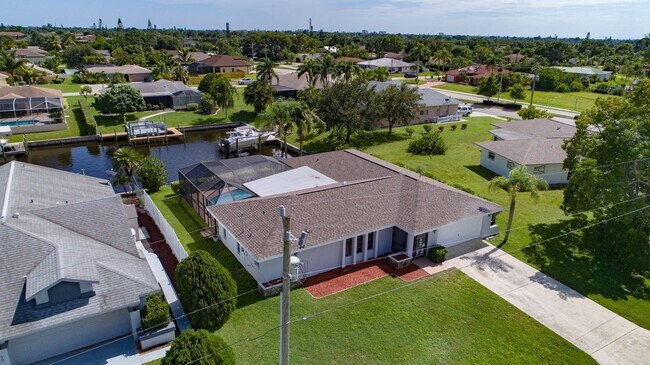 Foto del edificio - Gulf Access Pool Home. 4BED/2BATH. SE OF CAPE CORAL FL. Special Offer! Qualify for a deposit-free...