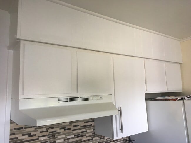 Cabinets have been newly painted. - 1285 Commonwealth Ave