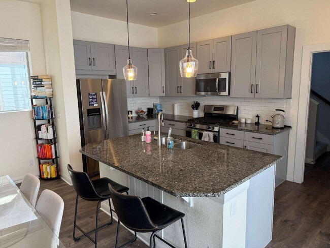 Building Photo - "Spacious 4-Bedroom Sanctuary with 3.5 Bat...