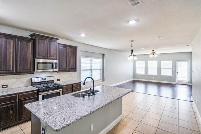 Building Photo - The home has 3 marvelous bedrooms and 2 fu...
