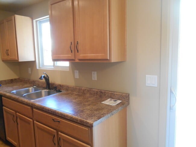 Building Photo - South Reno: Three Bedroom Home w/ RV Parking