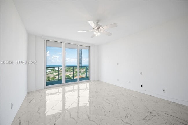 Building Photo - 19380 Collins Ave