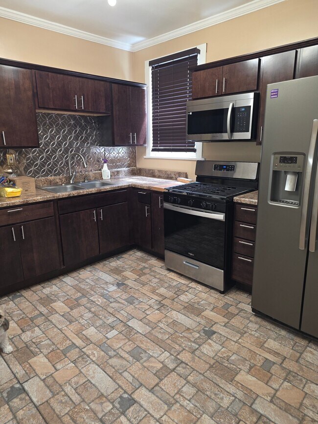 Foto del edificio - 7834 S Langley Ave