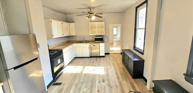 Photo - Spacious 4-Bedroom Home with 3-Car Garage, Deck & More!!