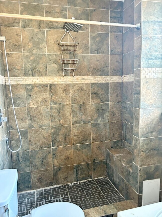Building Photo - Condo with free heat! In-unit laundry, har...