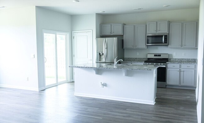 Building Photo - PRICE IMPROVEMENT! DEPOSIT FREE OPTIONS!  ...