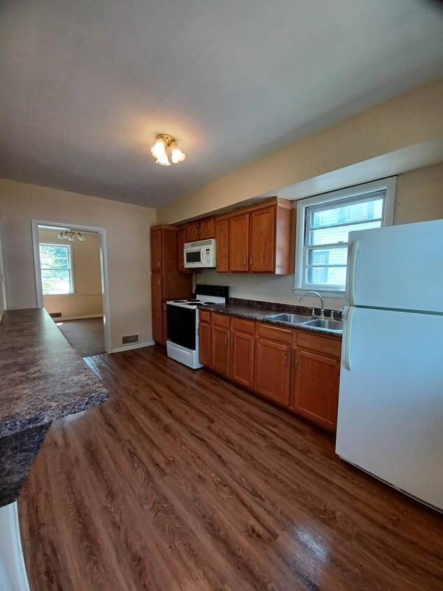 Primary Photo - 4 Bedroom House with a Detached Garage
