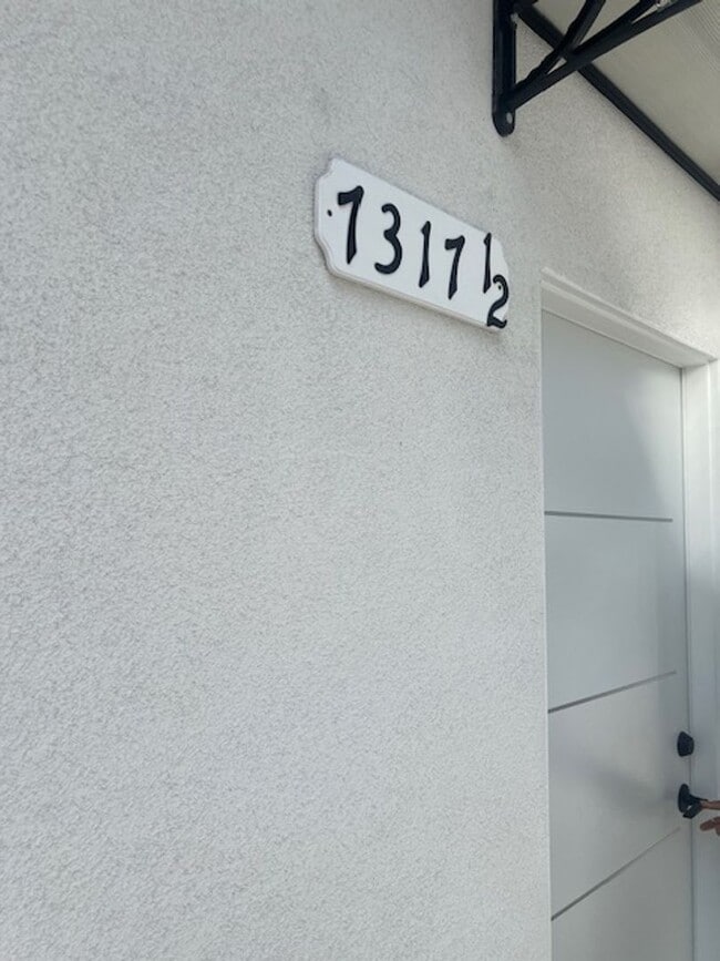 Building Photo - 7317-7321 Garden Grove Ave