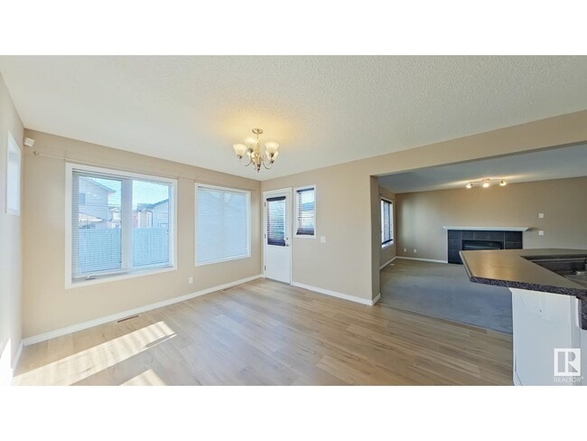 Building Photo - 6104-6106 6 Ave SW