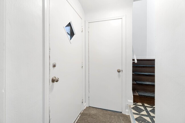 Entryway - stairs to unit and basement - 6569 Rosemoor St