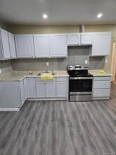 Building Photo - 105-12 Liberty Ave