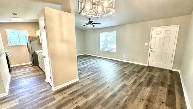 Building Photo - RENOVATED 2/2 w/ Updated Flooring, Paint, Appliances, & Fixtures! Open Floor Plan & Fenced Yard! ...