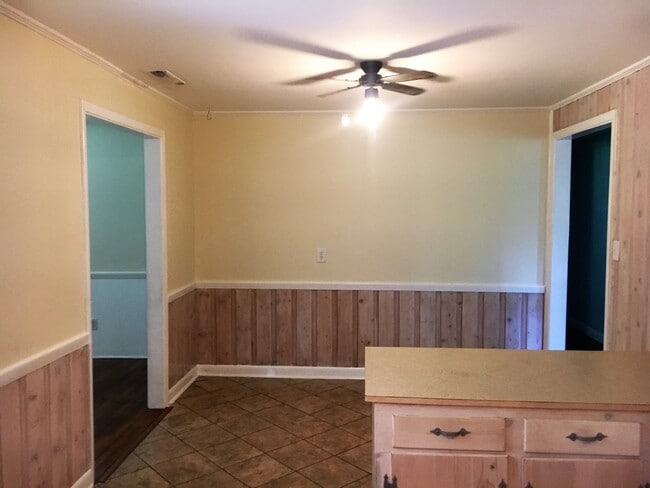 Building Photo - Cottage style brick ranch home, carport, f...