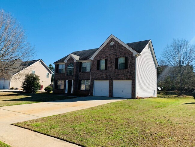 Photo - Prime location! 4 bed, 2.5 bath, LVP floor... House