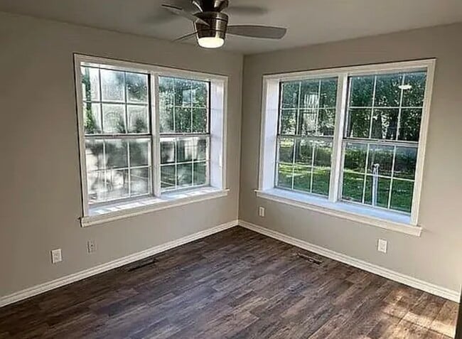 Beautiful bedrooms with great lighting from windows. - 105 S Poplar St