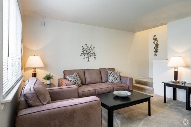 2BR, 1BA - 850SF - Living Room - The Hamptons of Brownstown Apartments