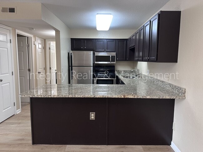 Building Photo - 13095 W Cedar Dr